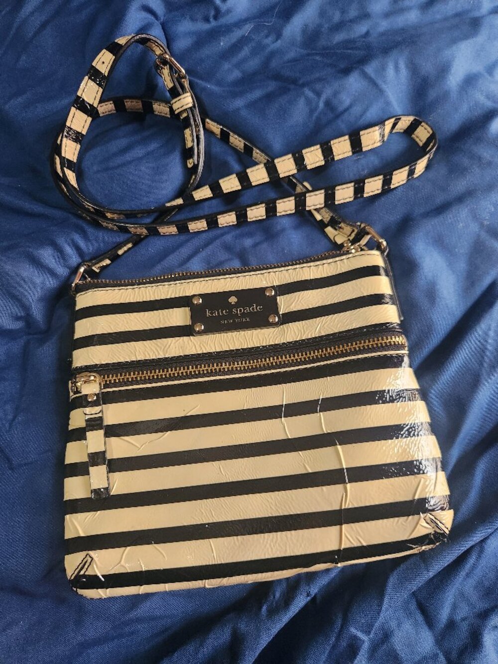 Stripped kate spade cross body bag